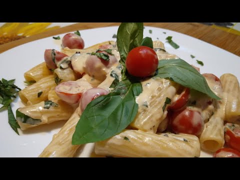 RIGATONI CON POMODORINI E FONDUTA DI FORMAGGIO