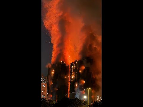 Hong Kong officials bow in apology over deadly fire