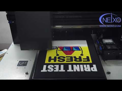Double Head Industrial Grade Neixo DTG printer priting on Black T shirt