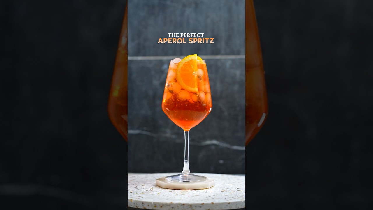 Aperol Spritz 🍊🍹 #AperolSpritz#SummerCocktails#SpritzSeason#EasyCocktailRecipe