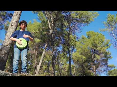 Ben Miiler with his Acid Green Ktak - the Portable Cajon by Kandu Cajon's