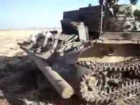 دبابة مدمرة في حاجز مساكن جلين في ريف درعا بعد السيطرة عليه من قبل تجمع ألوية أحفاد الرسول