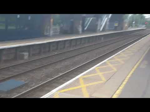 the next train will not stop please stand back  Stansted express train to Stansted Airport