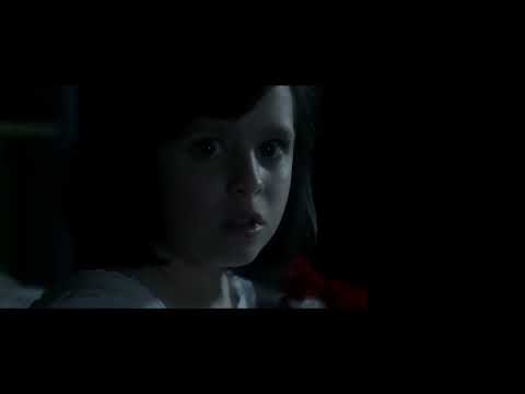 Deliver Us From Evil official trailer still: rain-soaked Bronx night with flashing police lights