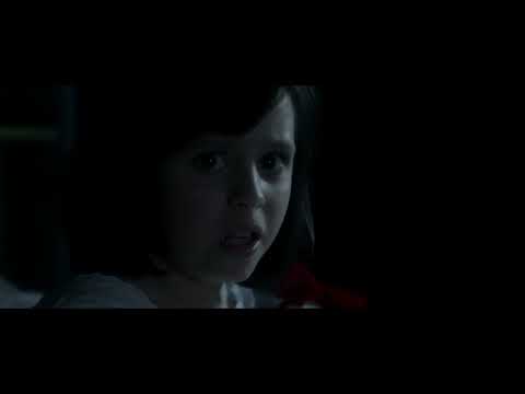 Deliver Us From Evil trailer collage: crucifix, interrogation room, and rain—mirroring the soundtrack’s sacred/procedural blend