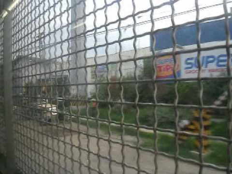 T 16:17 Arriving San Pedro Major Crossing At back of Super 8 Grocery