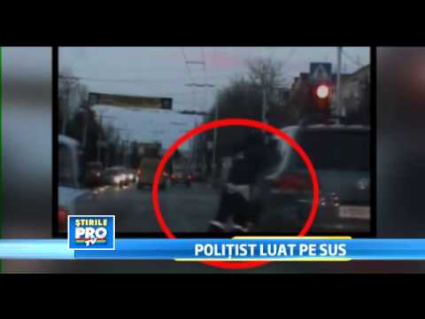 Imagini incredibile in Rusia. Un politist este luat pe sus de un sofer caruia ii ceruse actele