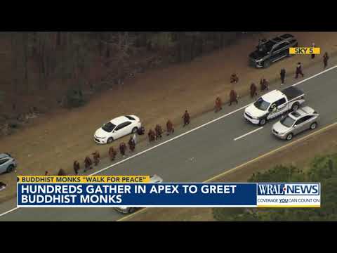 Hundreds gather in Apex to greet Buddhist monks on their 'Walk For Peace'