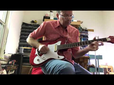 Jeremy Slemenda Playing a Hallmark Deke Dickerson II Guitar