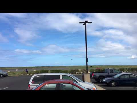 The F-22 Raptors Taking Off Using AfterBurners