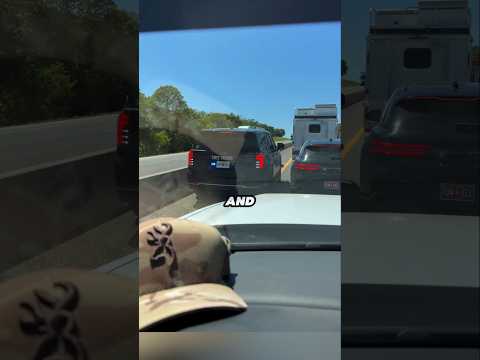 Cop Squeezes Through Traffic… Then Clips a Driver’s Mirror