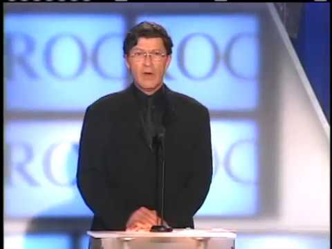Robbie Robertson inducts Eric Clapton Rock and Roll Hall of Fame inductions 2000