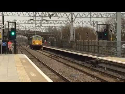 0Z87 Willesden TMD - Mossend 87002 hums and roars passed Bletchley 18/12/2014