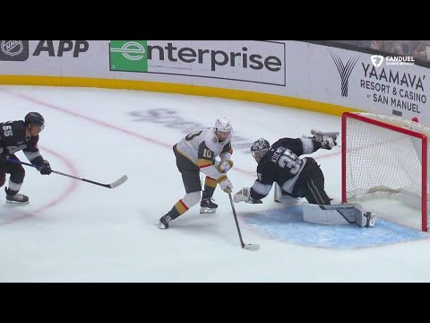 Darcy Kuemper makes a sprawling pad save on Nicolas Roy.