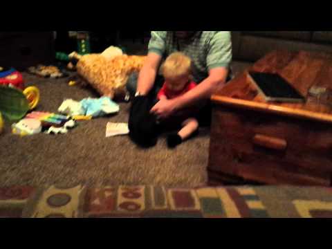 Grampa changing Huds' diaper