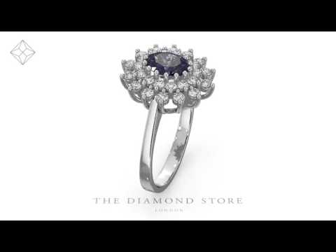 FET36-VY - Tanzanite 7 x 5mm And Diamond 18K White Gold Ring