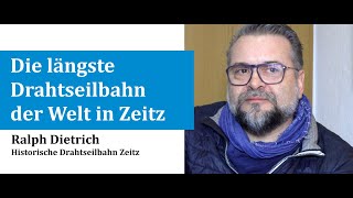 Keajaiban dunia ke-8 di Zeitz: Ralph Dietrich dalam wawancara video tentang sejarah dan pemulihan kereta gantung terpanjang di dunia dan asosiasi "Kereta Gantung Bersejarah Zeitz eV".
