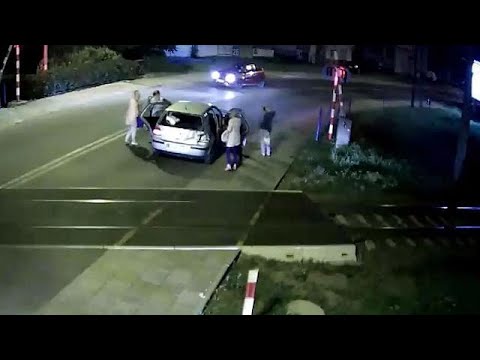 Four people narrowly avoid death on train crossing