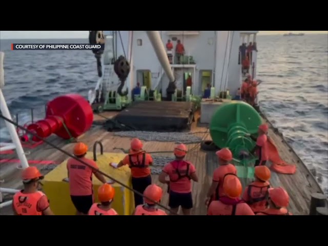 WATCH: Coast Guard sets up buoys with Philippine flag in West PH Sea