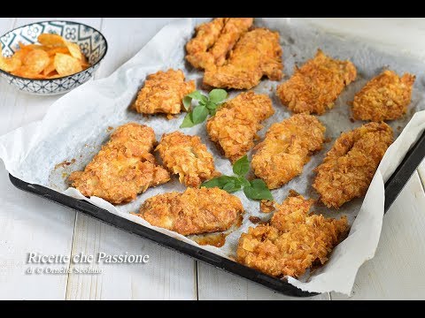 Petti di pollo con panatura croccante e gustosa con patatine alla paprika Ricette che Passione