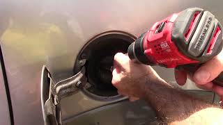 Remove Locking gas cap without key.