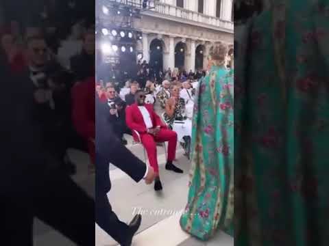 Diddy watching Jlo arrive at Dolce & Gabbana fashion show in Italy