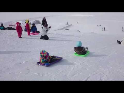 Snowy mountain toboggan snow play