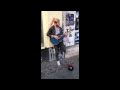Streetmusician sings - Original singer comes along ...