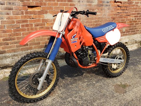 1986 Honda CR250.  HOLY COW !!  HAAAANG ON !!
