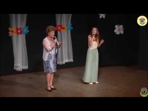 Nicole Zilberman with her vocal teacher sings Yiddish song.