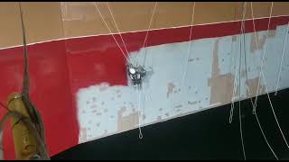 Rope access spray painting