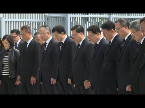 Hong Kong govt observes moment of silence for fire victims | AFP