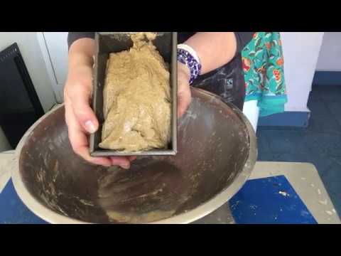 How to put together a rye dough and shape it to go into a tin