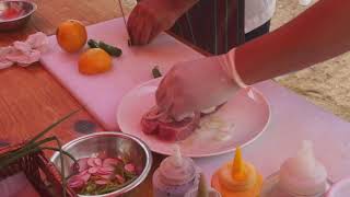 Cooking Fresh Tuna on Hot Stones at the Pueblo Bonito Pacifica Golf & Spa Resort