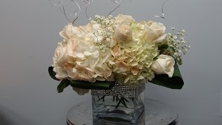 How to make a low wedding centrepiece with roses and hydrandeas