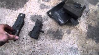 Destroyed motor mounts removed from 1983 Oldsmobile Cutlass