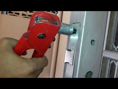 Install handle and lock onto aluminium door