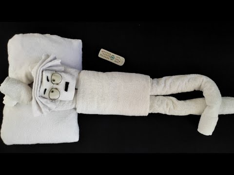 How to make relaxing man using towel | towel folding | towel art | towel origami