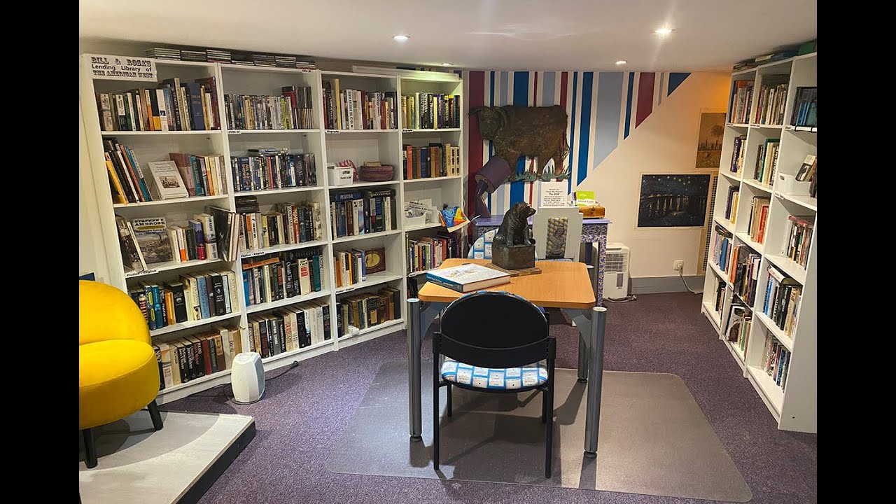 Bookshelves and reading furniture inside Bill & Rosa’s Book Room