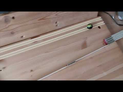 Collision experiment with marbles - unequal masses -  small mass against big mass