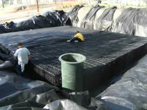 Construction of 30,000 gallon modular, underground rainwater...