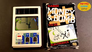 LCD handheld from CASIO named Money & bomb