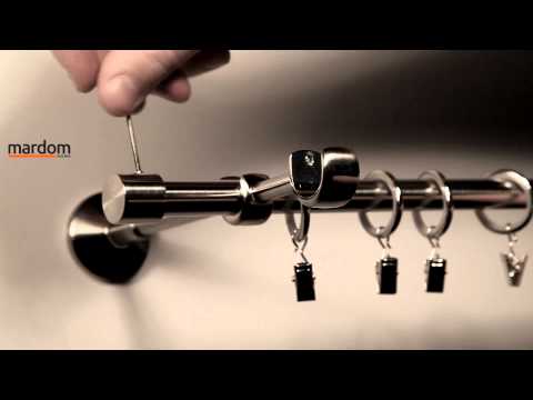 Montaż karnisza za pomocą blaszki montażowej na trzy kołki