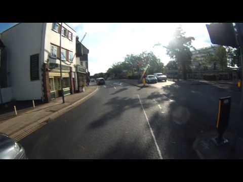 Driver runs a red light and knocks off a motorcyclist
