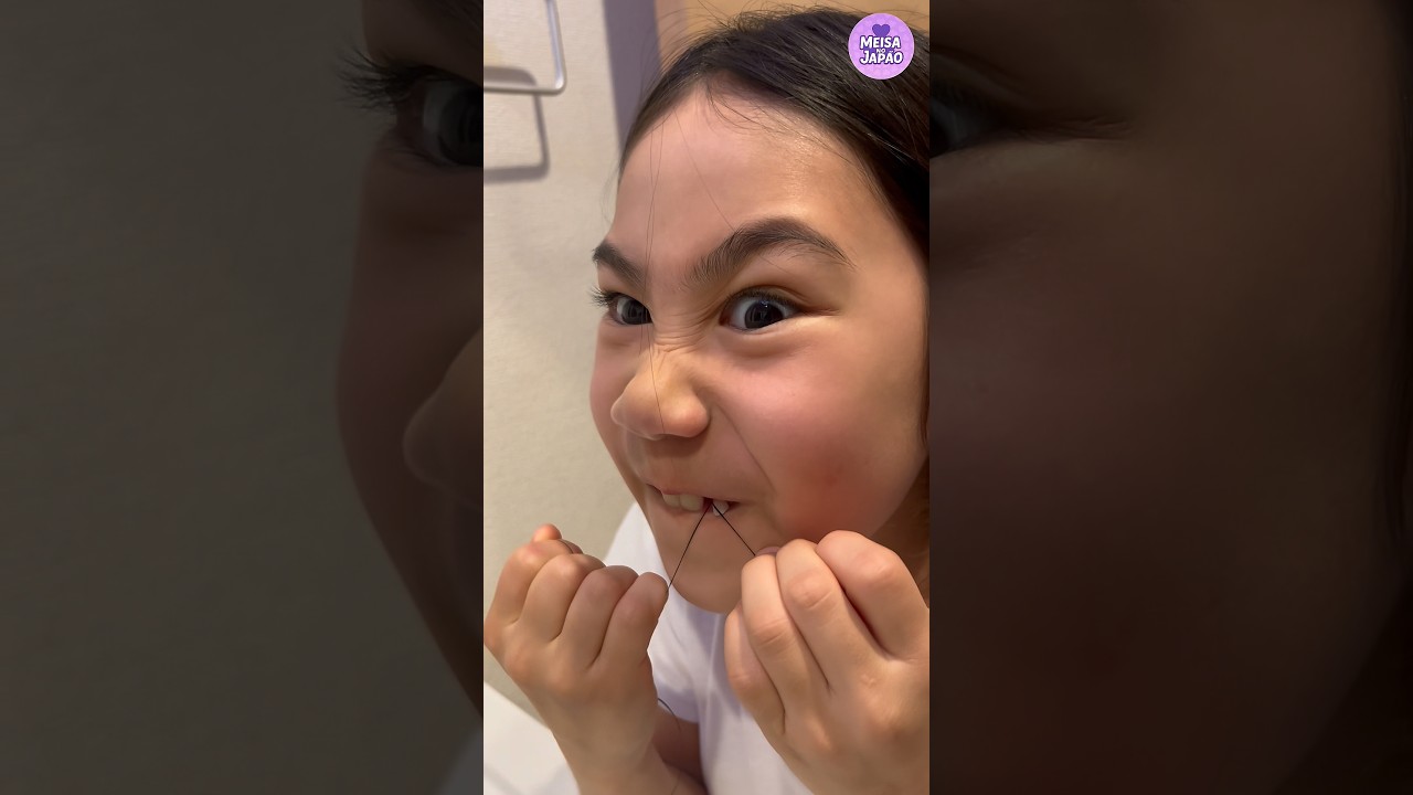 Será que Meisa consegue? Dente de leite quase caindo! 😬🦷 #shorts