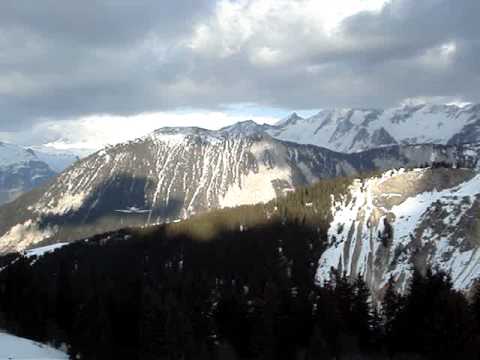 The Glory Of Watching A Plane Take Off From A Runway On The Side Of The Alps