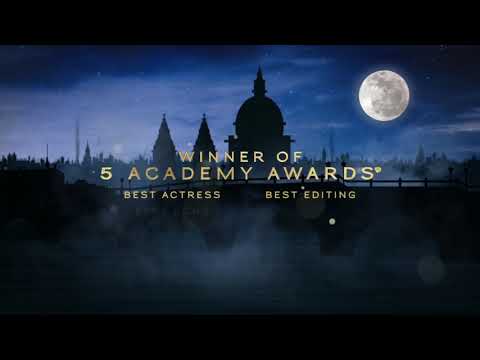 Mary Poppins trailer shot of Mary holding her umbrella as she prepares to fly away above the park