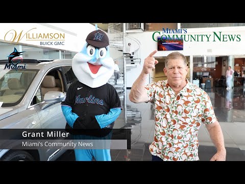 Billy the Marlin and Grant Miller Miami Community Newspapers checking Williamson Cadillac