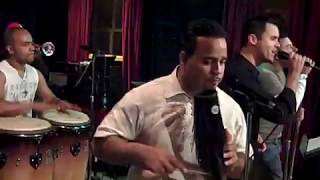 2009 10 06 22 48 04 ---lead singer juicy jusino and eric velez congas/ track title cd huracan