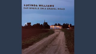 Car Wheels On A Gravel Road